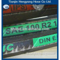 Industrial rubber hose reinforced with fabric cover